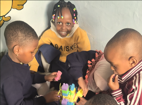Head Start pupils in class activity